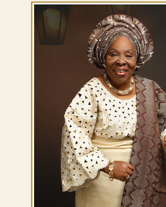 Margaret Monisola Osinaike smiling in traditional Nigerian attire